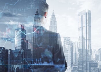 gambar seseorang dengan 2 siluet gedung