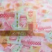 Uang rupiah pecahan Rp100.000 dan Rp50.000 bertumpuk